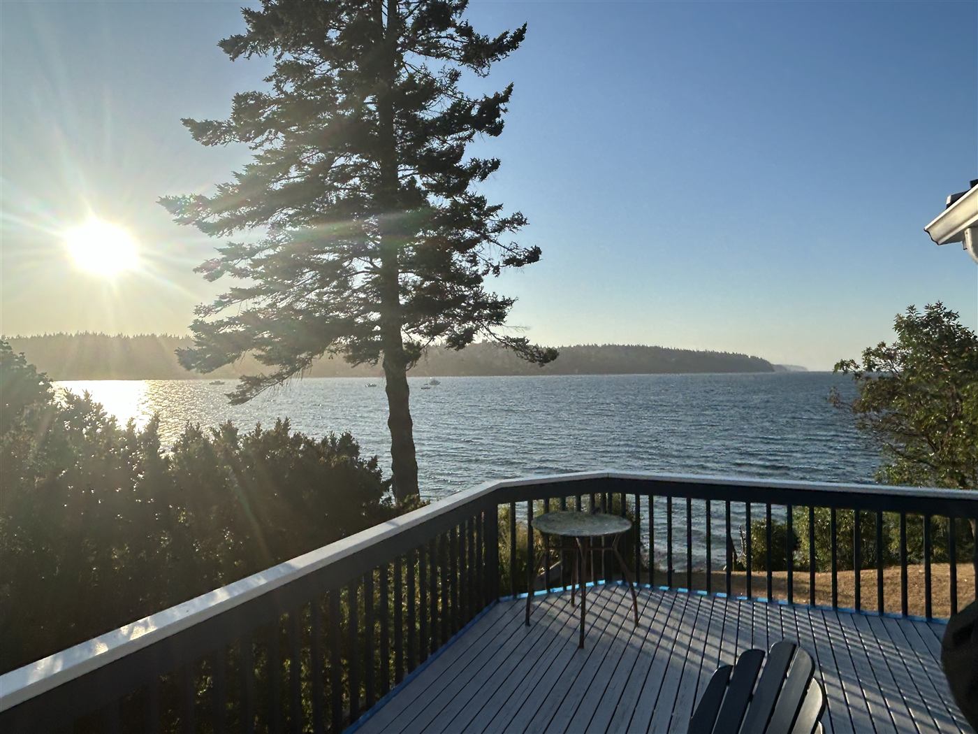 Clean waterfront deck overlooking Puget Sound after Property Bros service
